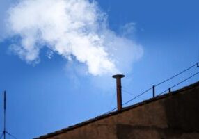 White,Smoke,From,The,Chimney,On,Top,Of,The,Sistine
